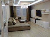 Фото гостиной после ремонта квартиры в ЖК Голосевский от компании АВР-Комфорт