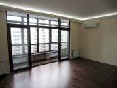 Фото после ремонта гостиной с раздвижной перегородкой в ЖК 