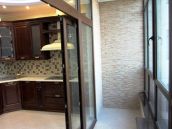 Фото остекленного балкона после ремонта в квартире на Печерске от компании 